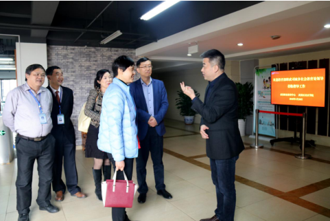 教育部职成司城乡社会教育处调研员蔡妍在成都社区大学党委书记赵刚陪同下赴武侯区调研指导.jpg